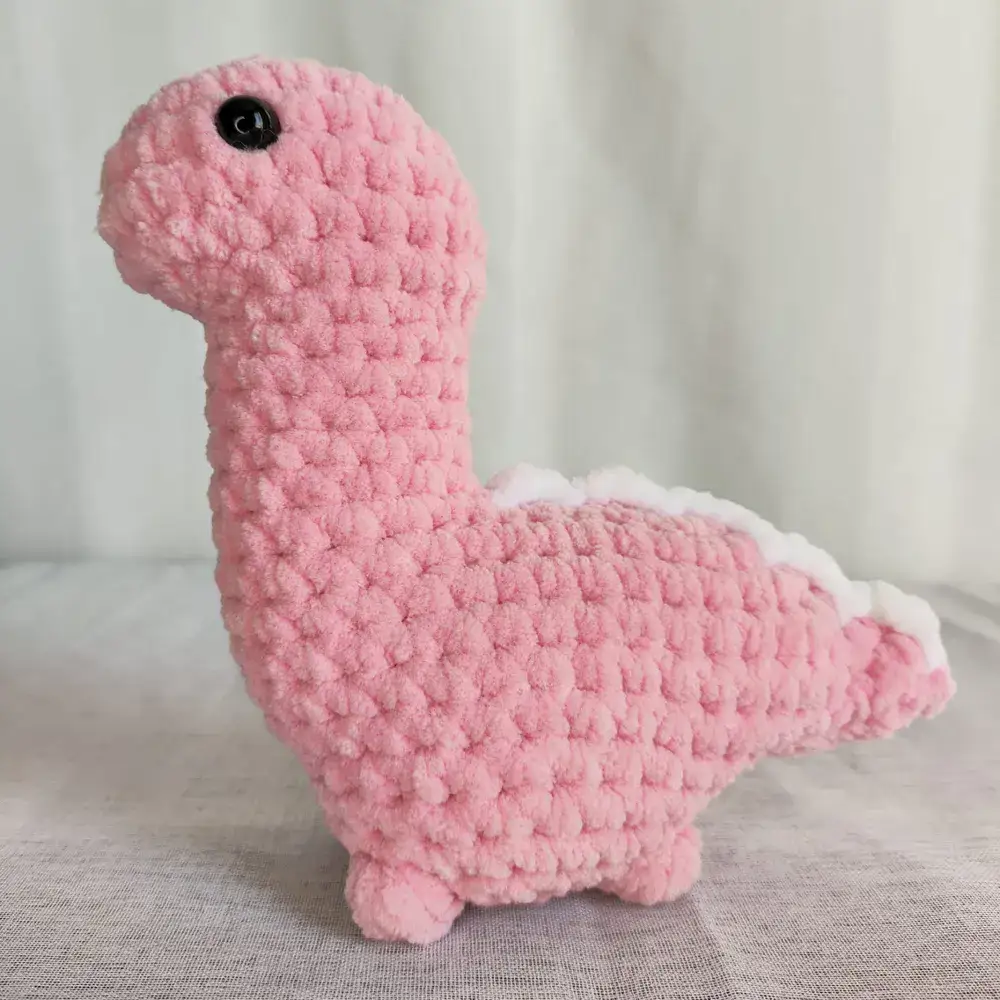 דינוזאור ורוד בהיר