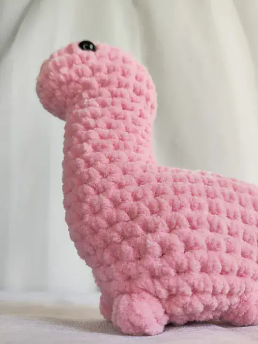 דינוזאור ורוד בהיר